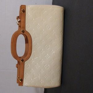 Authentic Louis Vuitton monogram Vernis Roxbury Drive cream handbag.